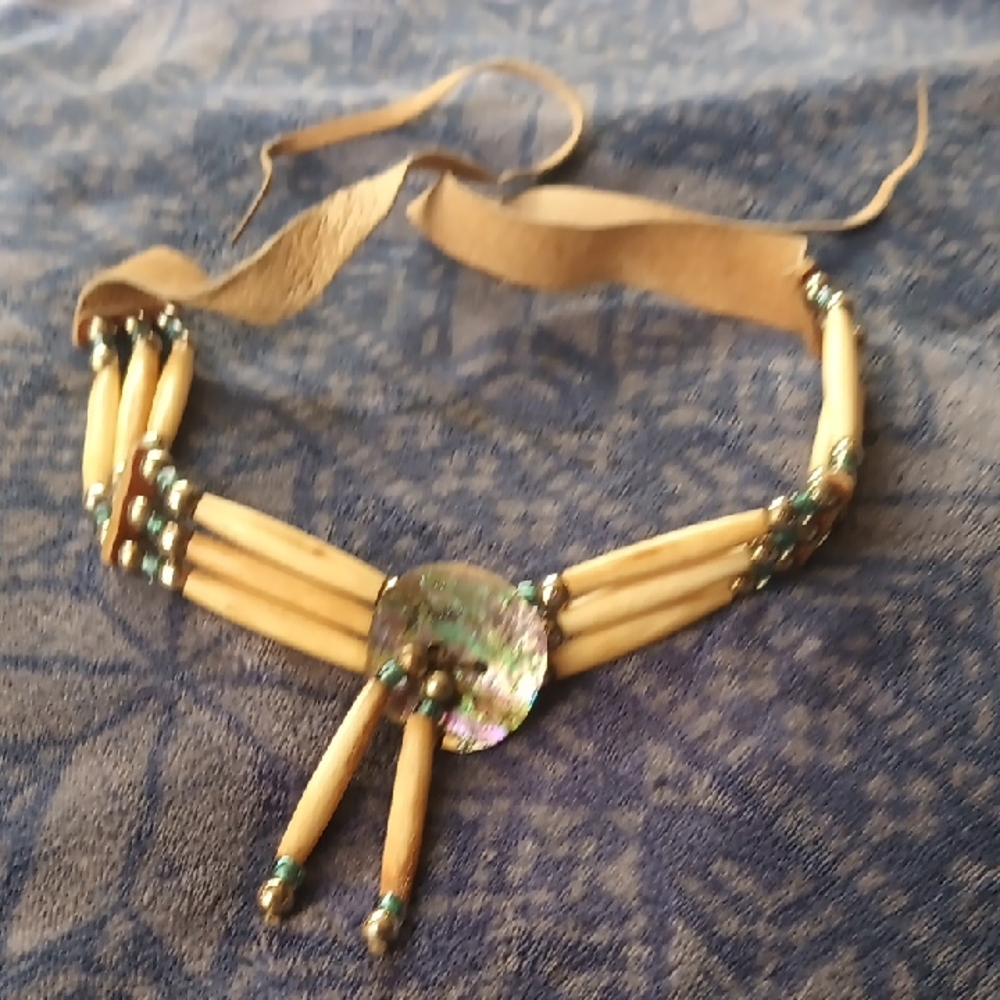 Handcrafted Beaded Necklace with Shell Pendant